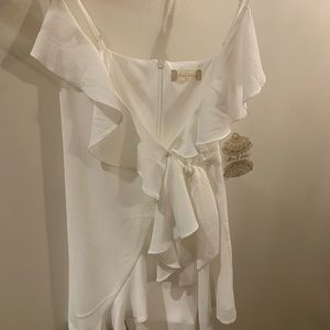 White Flowy Romper with tags